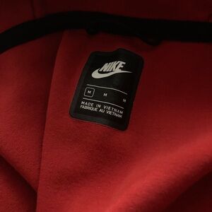 men’s Nike tech red